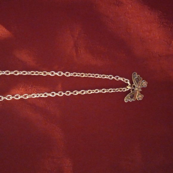 Amethyst crystal butterfly pendent on a 18 inch circle link chain toggle clasp - Picture 3 of 4
